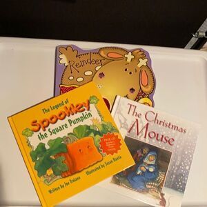 Holiday themed kids hard back books. 3